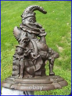 ANTIQUE DOOR STOP folk art JOKER & DOG old CAST IRON jester rare ESTATE SALE