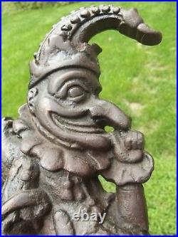 ANTIQUE DOOR STOP folk art JOKER & DOG old CAST IRON jester rare ESTATE SALE