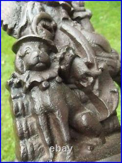 ANTIQUE DOOR STOP folk art JOKER & DOG old CAST IRON jester rare ESTATE SALE