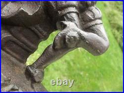 ANTIQUE DOOR STOP folk art JOKER & DOG old CAST IRON jester rare ESTATE SALE