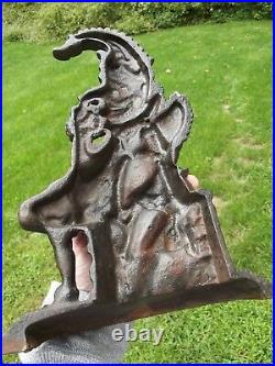 ANTIQUE DOOR STOP folk art JOKER & DOG old CAST IRON jester rare ESTATE SALE