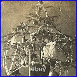 Antique Snapshot Photograph Little Girls First Christmas Tree Toy Elf Dress Odd