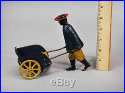 Antique Strauss Tip Top Key Wind Tin Toy, Black Man Porter, NR