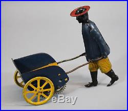 Antique Strauss Tip Top Key Wind Tin Toy, Black Man Porter, NR