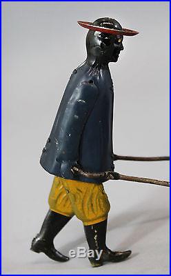 Antique Strauss Tip Top Key Wind Tin Toy, Black Man Porter, NR