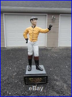 Antique cast iron lawn jockey