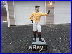 Antique cast iron lawn jockey