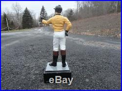 Antique cast iron lawn jockey