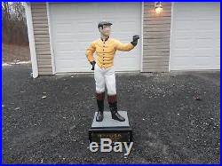 Antique cast iron lawn jockey