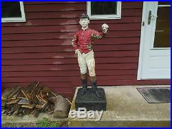 Antique lawn jockeys, two, each one is signed by the foundry