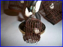 BLACKAMOOR AMERICAN COLD PAINTED METAL FIGURE WITH CAGES OF BIRDSPETITE CHOSES