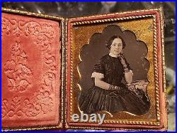 Beautiful sixth plate daguerreotype of a young woman in fancy dress and case