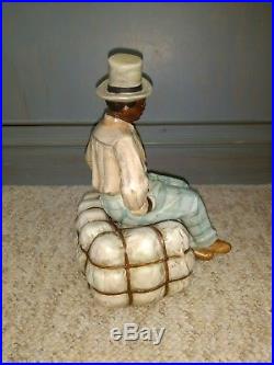 Black Americana German Bisque Porcelain Man Cotton Bale Figurine