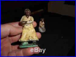 Black Americana antique C. I. Figures or toys, Mother and daughter iron decor