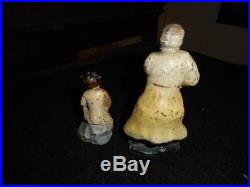 Black Americana antique C. I. Figures or toys, Mother and daughter iron decor