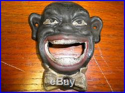 Black Face cast iron bottle opener or paper weight new antique finish wall mount