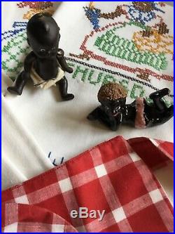 Black memorabilia/americana apron, baby doll, apron, salt shaker, towels