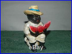 Collectible Cast Iron Black Americana Boy Sitting Eating Watermelon Penny Bank