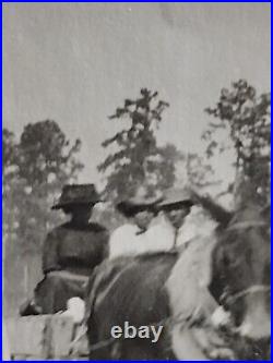 Colored Female's Riding on dirt road heading to town Greenwood Mississippi