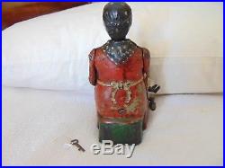 Kyser & Rex 1890 Mammy With Spoon Red Dress Baby Yellow Dress Cast Iron Bank