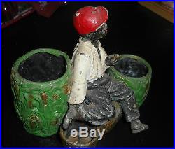 Old Vintage Cold Painted Lead Black Boy Smoking Pipe Sitting On Corn Basket