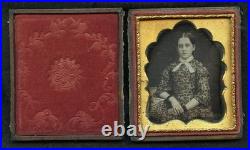 Sixth plate daguerreotype in a full split case of pretty young woman great mat