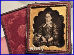 Sixth plate daguerreotype in a full split case of pretty young woman great mat