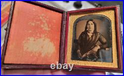 Sixth plate daguerreotype of a young lady with a great dress and curls