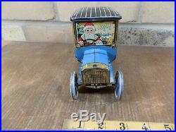 Superb Hudson Scott Santa Christmas Car Toy Biscuit Tin c1915 Black Americana