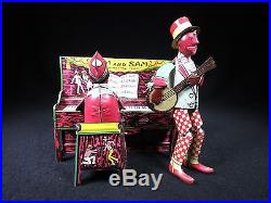 VINTAGE STRAUSS HAM & SAM PIANO MUSIC AMERICANA BLACK TIN LITHO WINDUP TOY WORKS