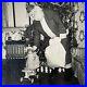 Vintage 1950s B&W Snapshot Photograph Santa Claus Gifts Doll Odd Christmas