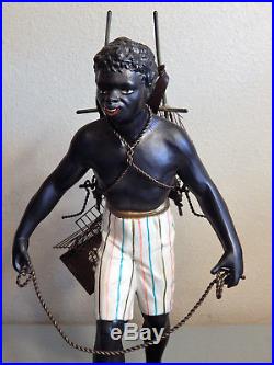 Vintage Large Petites Choses Blackamoor Figurine / statue, Man with Bird Cages