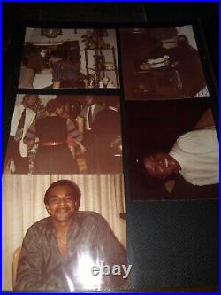 Vintage photo album with photos African American family