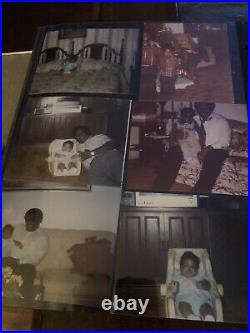 Vintage photo album with photos African American family