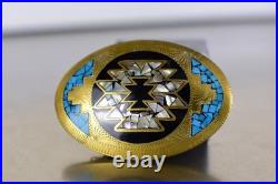 Zuni belt buckle, inlay work with turquoise, mother of pearl, and onyx