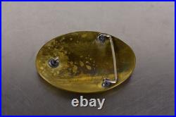 Zuni belt buckle, inlay work with turquoise, mother of pearl, and onyx